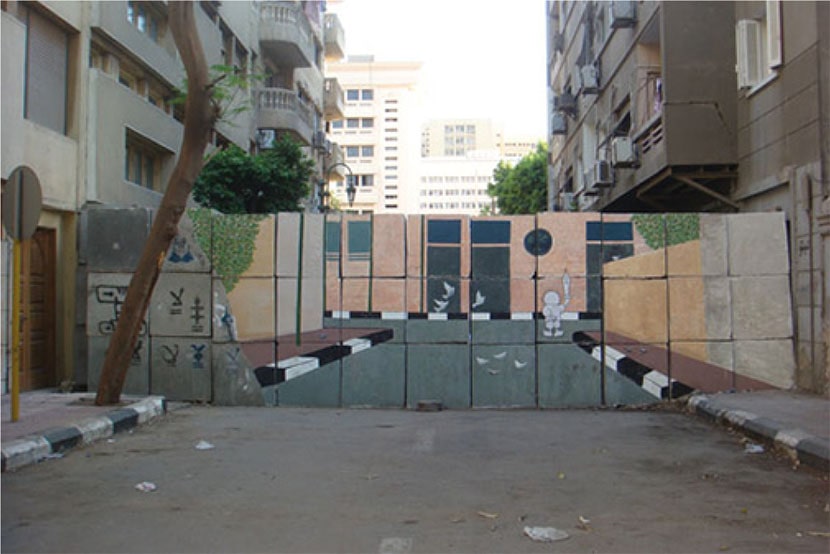 A stencil on one of the walls erected to prevent new protests in Tahrir Square. Photo  Maria Antonietta Malleo